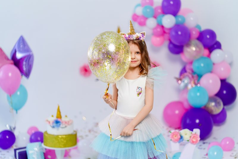 Unicorn,Girl,Holding,Gold,Confetti,Air,Baloon.,Idea,For,Decorating